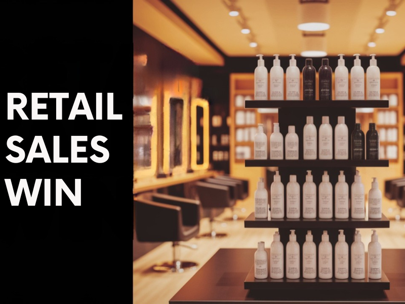 Beautifully stocked retail shelves in a luxury salon, showcasing clean, curated haircare products that boost client trust and drive sales.