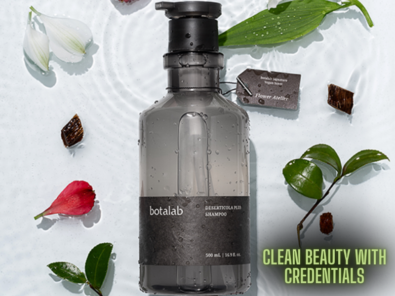 Botalab shampoo presented with clean design and floral accents emphasizing plant-based ingredients, FDA compliance, and European vegan certification.