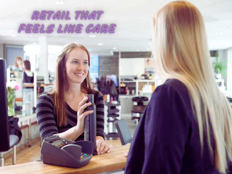 Hair salon client receiving personalized product recommendation at the front desk—boosting loyalty through retail care.