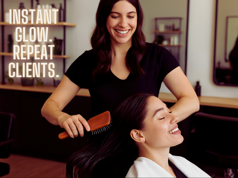 Happy salon client receiving hair brushing treatment—perfect for promoting instant shine, client trust, and loyalty through clean haircare services.