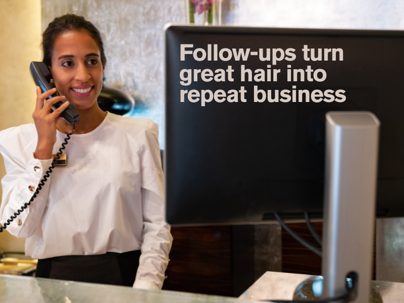 Salon receptionist making client follow-up call to increase hair appointment retention and loyalty.